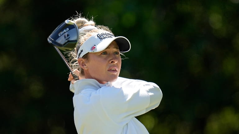 Nelly Korda watches her shot during the final round of...