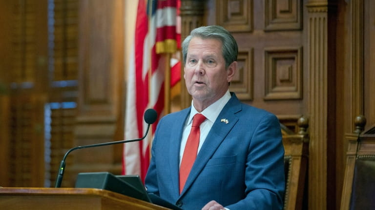 FILE -- Georgia Gov. Brian Kemp addresses the state House...