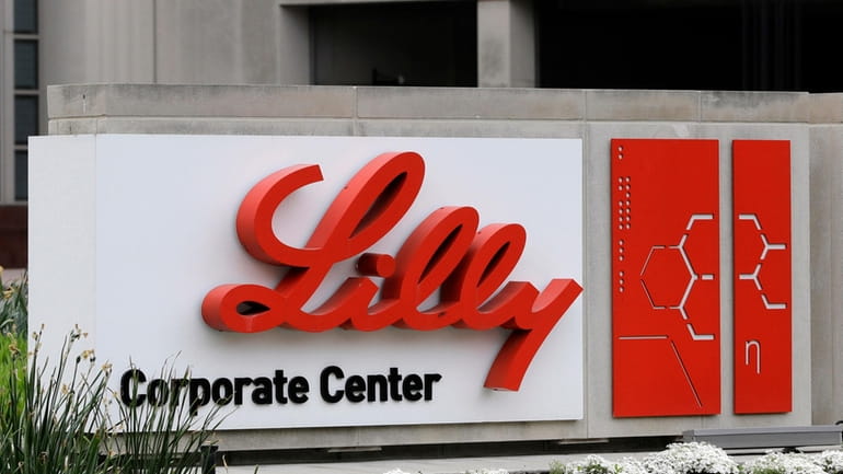 A sign for Eli Lilly & Co. sits outside their...