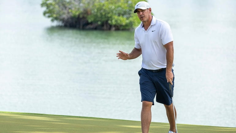 Captain Brooks Koepka, of Smash GC, reacts to his putt...
