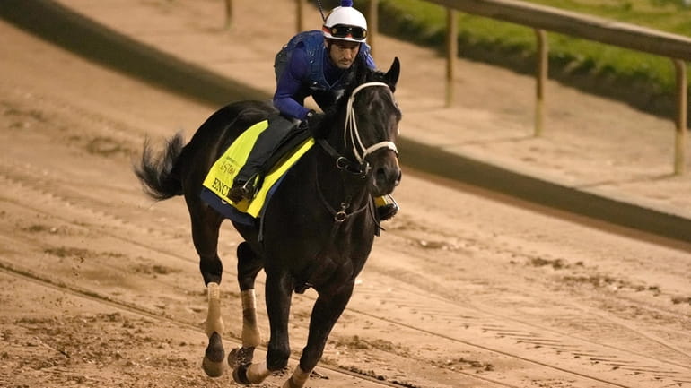 Kentucky Derby hopeful Encino works out at Churchill Downs Tuesday,...