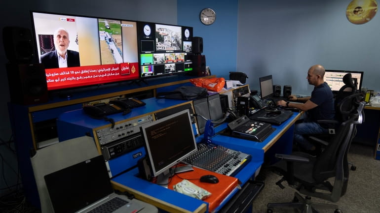 Al Jazeera broadcast engineer Mohammad Salameh works at the Master...