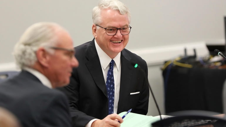 South Carolina Treasurer Curtis Loftis smiles during a meeting of...