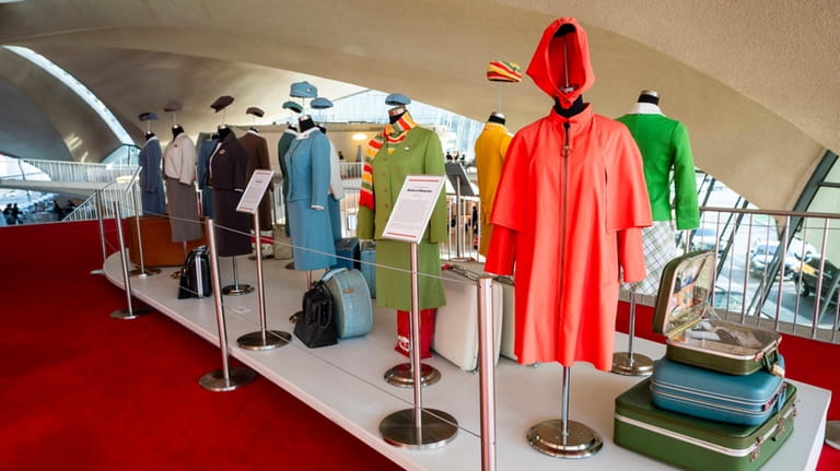A display of vintage uniforms worn by TWA staffers over...