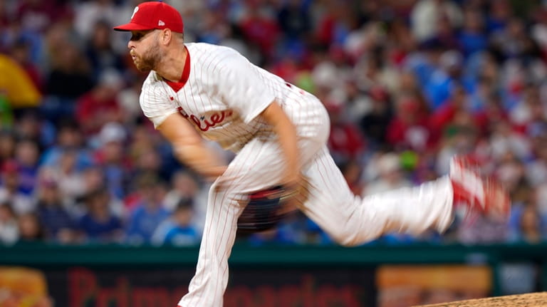 Philadelphia Phillies' Zack Wheeler pitches during the seventh inning of...