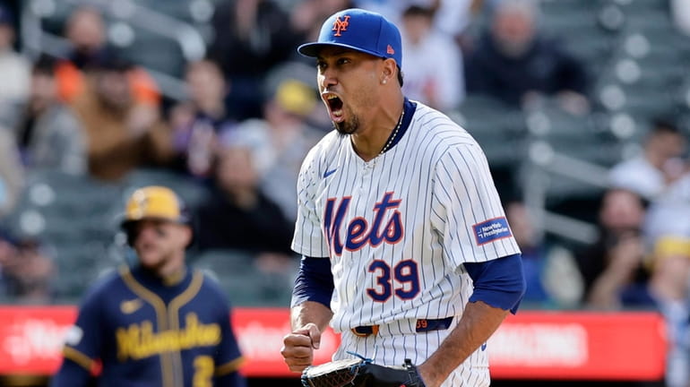 Edwin Diaz of the Mets reacts after the final out of...