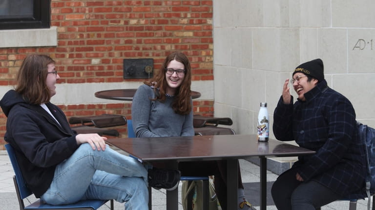 University of Kansas students, Chris Raithel, from left, Jenna Bellemere...