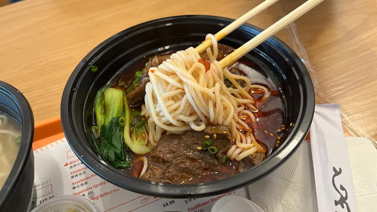 The spicy beef noodle soup at Noodumpling in Hicksville.