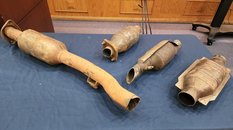 Stolen catalytic converters are displayed at Nassau County police headquarters in Mineola...