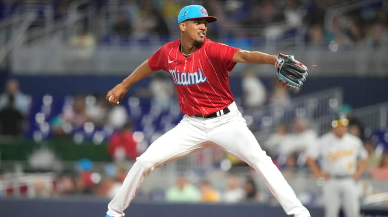 Miami Marlins starting pitcher Eury Perez throws during the fourth...