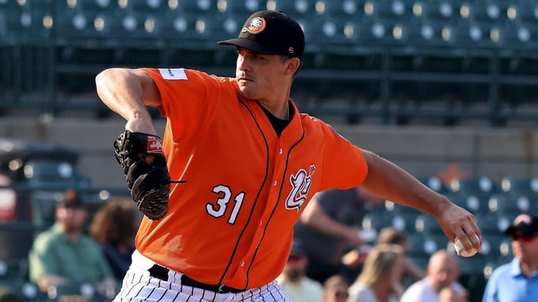 Long Island Ducks starting pitcher Kyle Lobstein delivers a pitch...