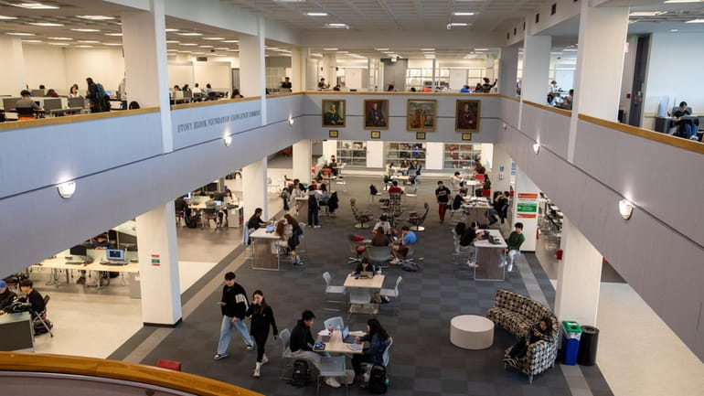 Students in the library at Stony Brook University.