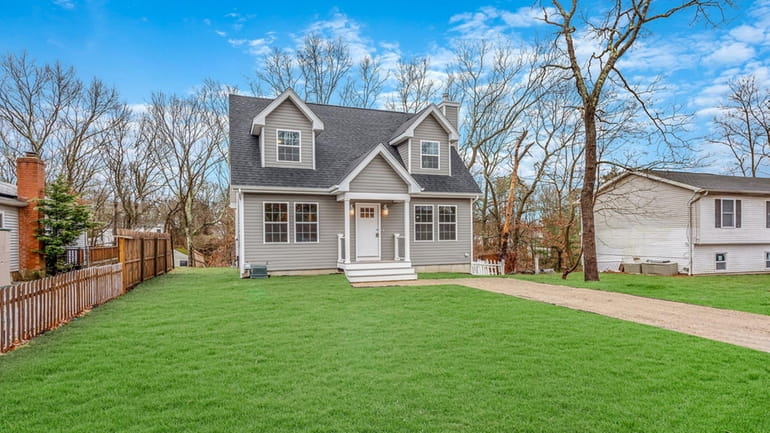 This new construction Cape in Shirley is in contract for...
