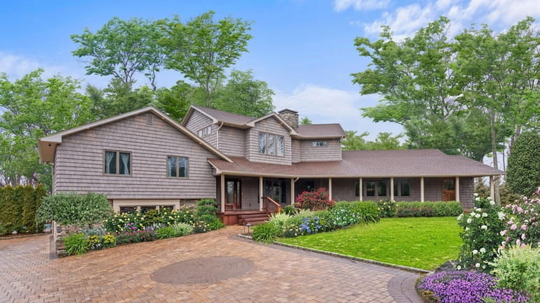 This Dix Hills home is on the market for almost...