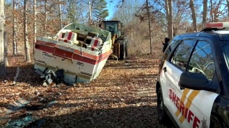 A 24-foot pleasure boat was dumped in the state-protected pine barrens...