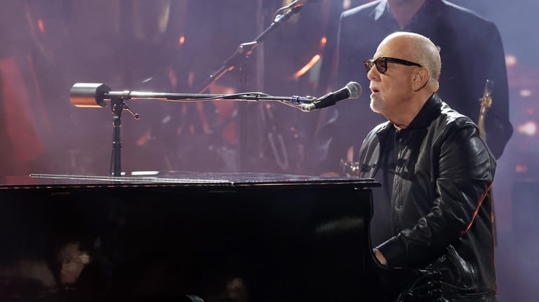 Billy Joel performs at "The 66th Grammy Awards" in Los...