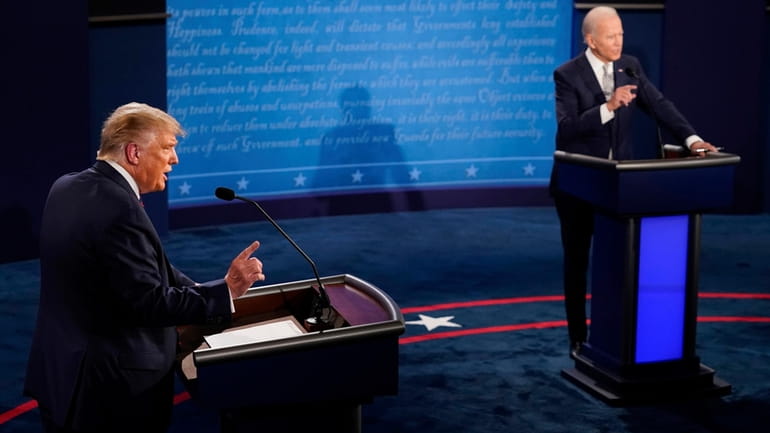 Donald Trump and Joe Biden face off during the first presidential...