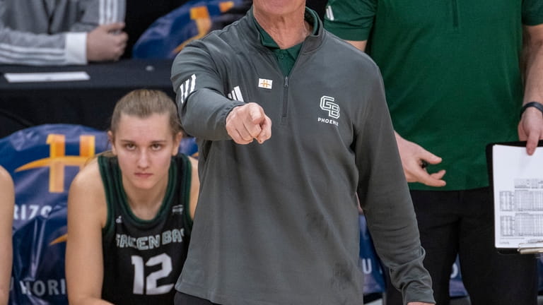 Green Bay head coach Kevin Borseth gestures during the second...