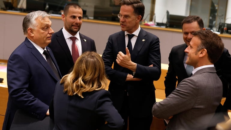 From left, Hungary's Prime Minister Viktor Orban, Malta's Prime Minister...