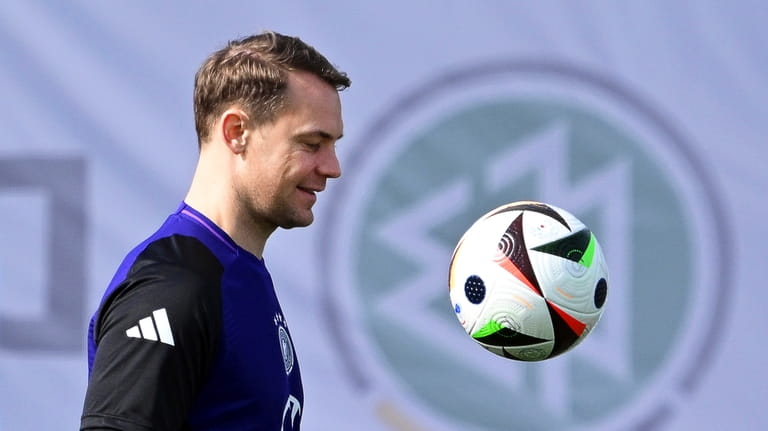 Germany's goalkeeper Manuel Neuer takes part in a training session...