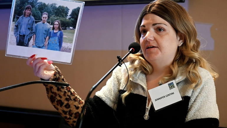 Heart transplant recipient Jennifer Lentini shows a photo of her...