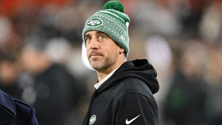 Aaron Rodgers of the Jets looks on prior to playing the...