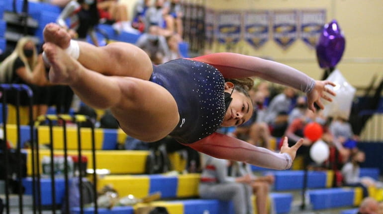 Amanda Cosentino of Smithtown competes in the vault during the...