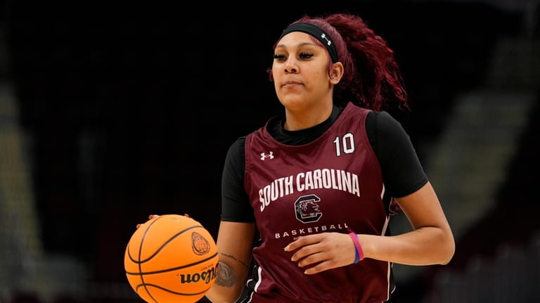South Carolina's Kamilla Cardoso dribbles during a practice for an...