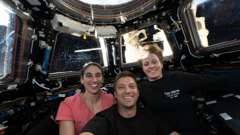 NASA astronauts, from left, Jasmin Moghbeli, Matthew Dominick and Loral...