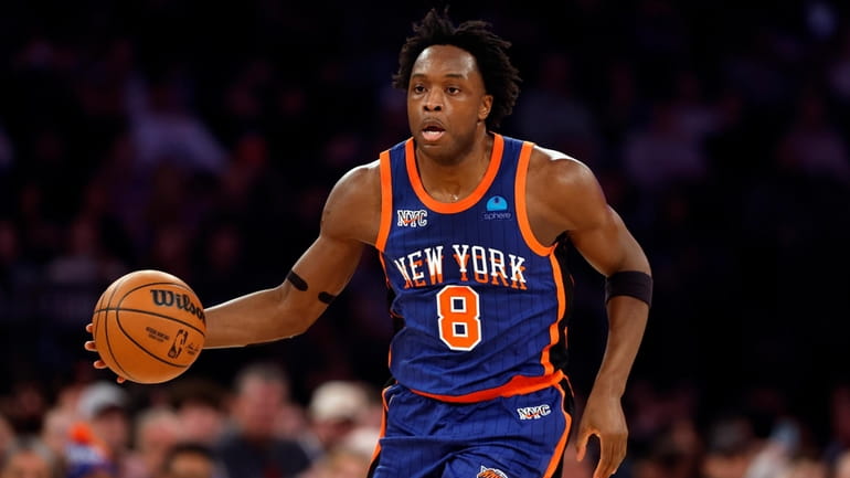 OG Anunoby #8 of the New York Knicks dribbles during...