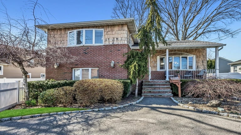 This $825,000 Massapequa Park home sits on an 80-by-100-foot lot.