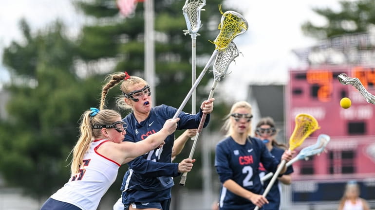 Amelia Bentley of Cold Spring Harbor shoots and scores her...