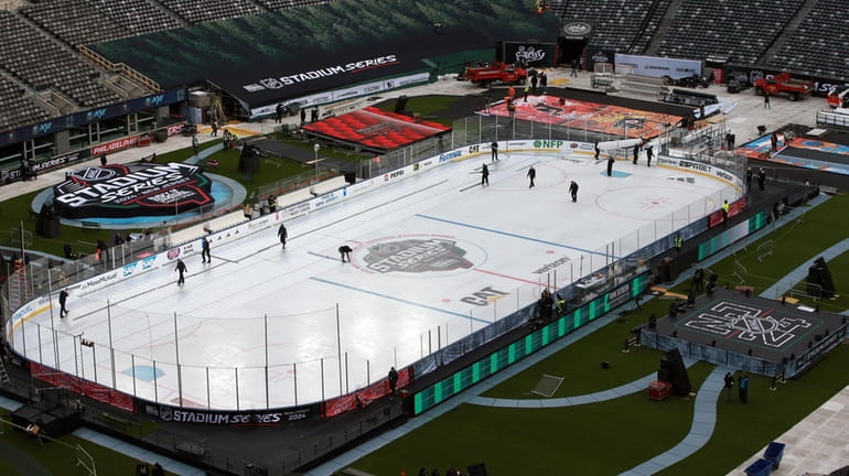 Ice gets last-minute preparation before Islanders practice at MetLife Stadium...