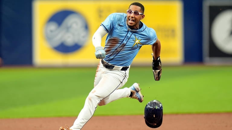 Tampa Bay Rays' Richie Palacios races home to score on...