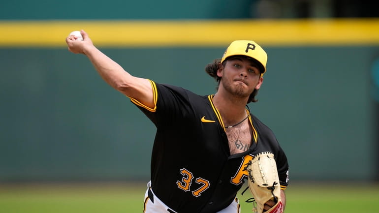 Pittsburgh Pirates starting pitcher Jared Jones throws during the first...