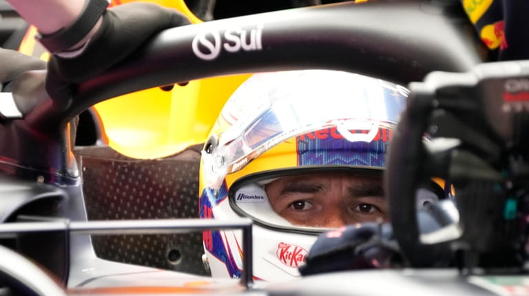 Red Bull driver Sergio Perez of Mexico prepares for the...