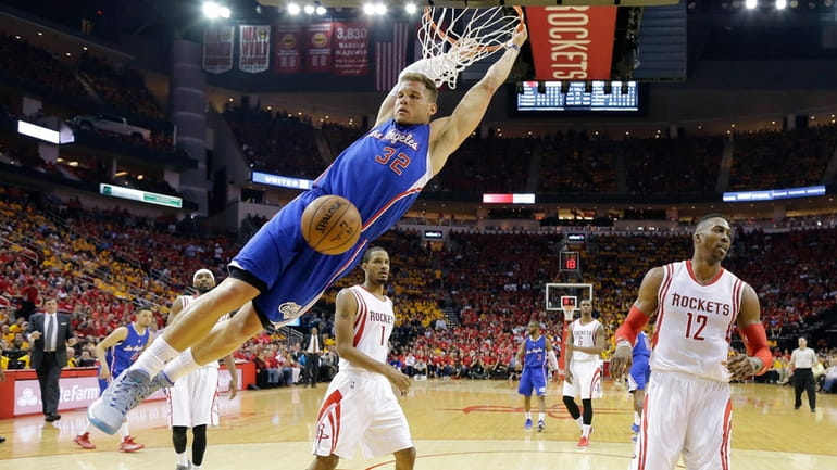 Los Angeles Clippers' Blake Griffin (32) scores past Houston Rockets'...
