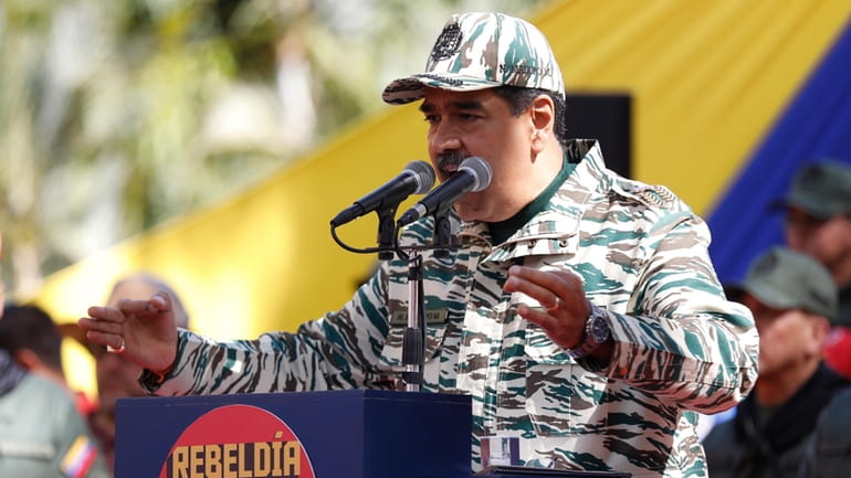 Venezuela's President Nicolas Maduro speaks during a rally marking the...