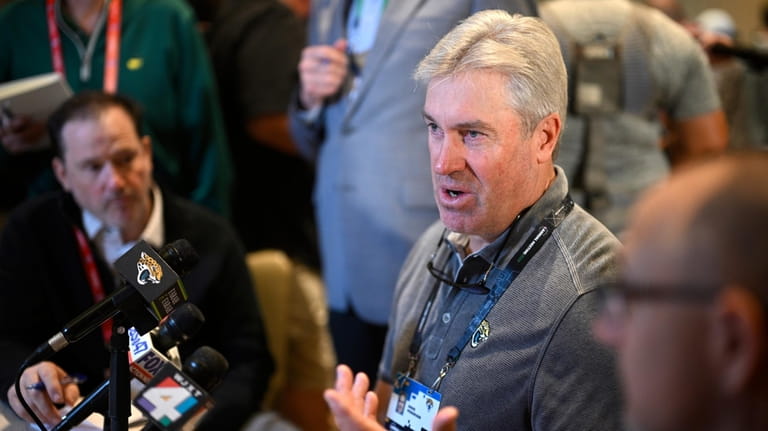 Jacksonville Jaguars head coach Doug Pederson talks with reporters during...