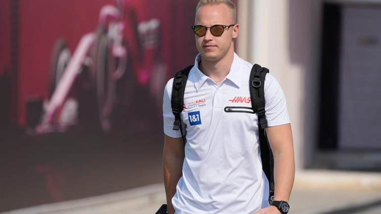 Haas driver Nikita Mazepin of Russia arrives to the Losail...