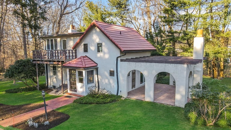 This $549,996 Mount Sinai home was built in 1900.
