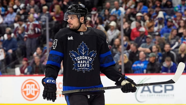Toronto Maple Leafs center Auston Matthews waits for play to...
