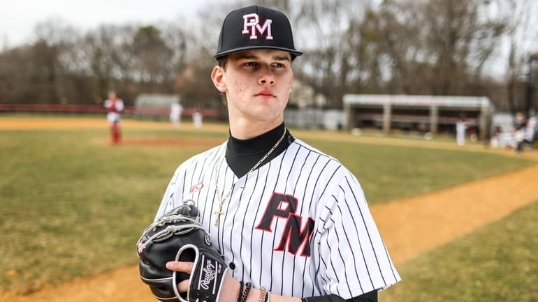 Josh Knoth of Patchogue-Medford baseball poses on the high school field...