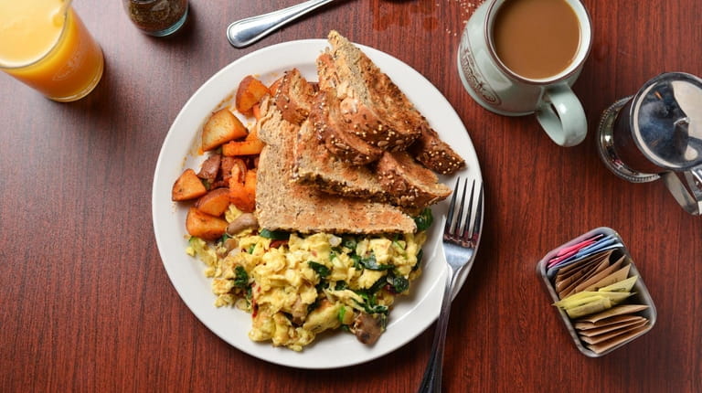 The Garden Gourmet Scramble with roasted zucchini, spinach, mushrooms, sun...