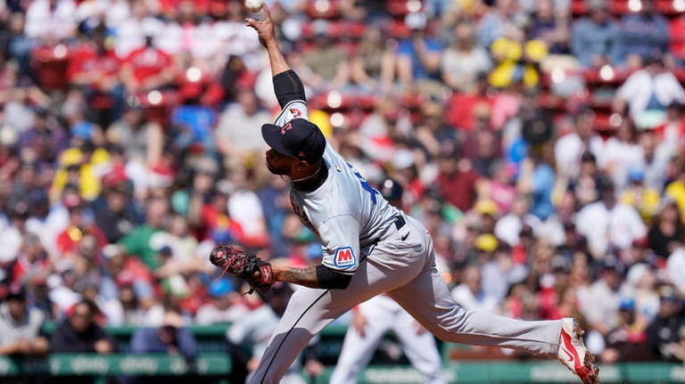 Cleveland Guardians' Xzavion Curry pitches against the Boston Red Sox...