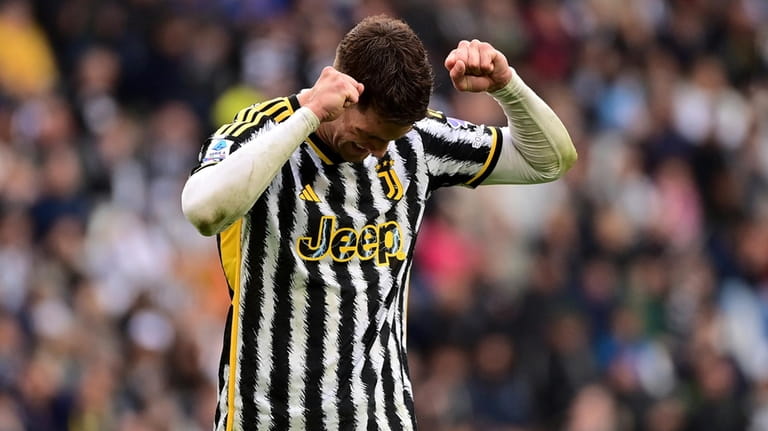 Juventus' Dusan Vlahovic reacts after failing a scoring chance during...