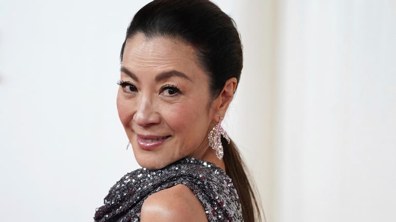 Michelle Yeoh arrives at the Oscars on Sunday, March 10,...