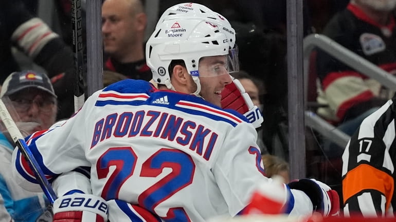 New York Rangers center Jonny Brodzinski celebrates his goal against Chicago...
