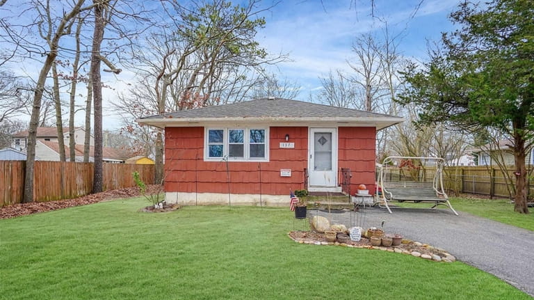 This $385,000 Mastic home contains 1,100 square feet.