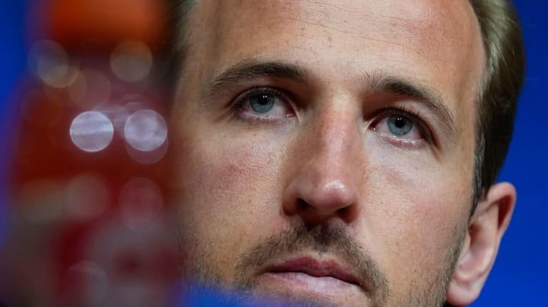 Bayern's Harry Kane attends a news conference in Munich, Germany,...